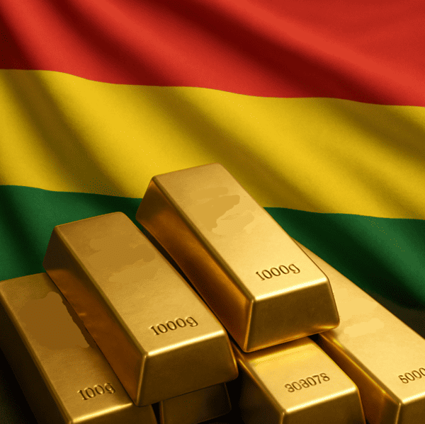 Lingotes de oro con la bandera de Bolivia