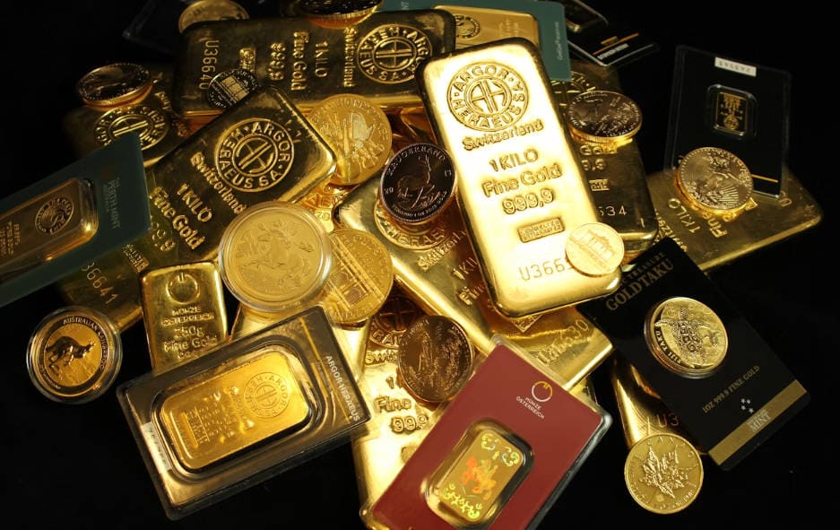 Pile of gold bullion coins and bars