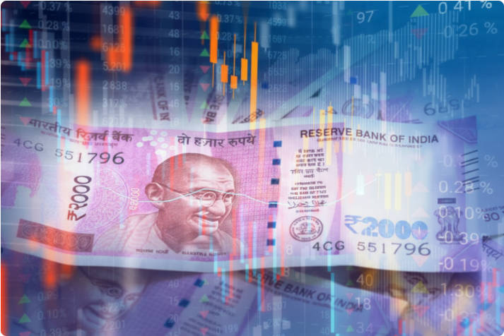 Indian Rupee paper currency on virtual interface of stock market data