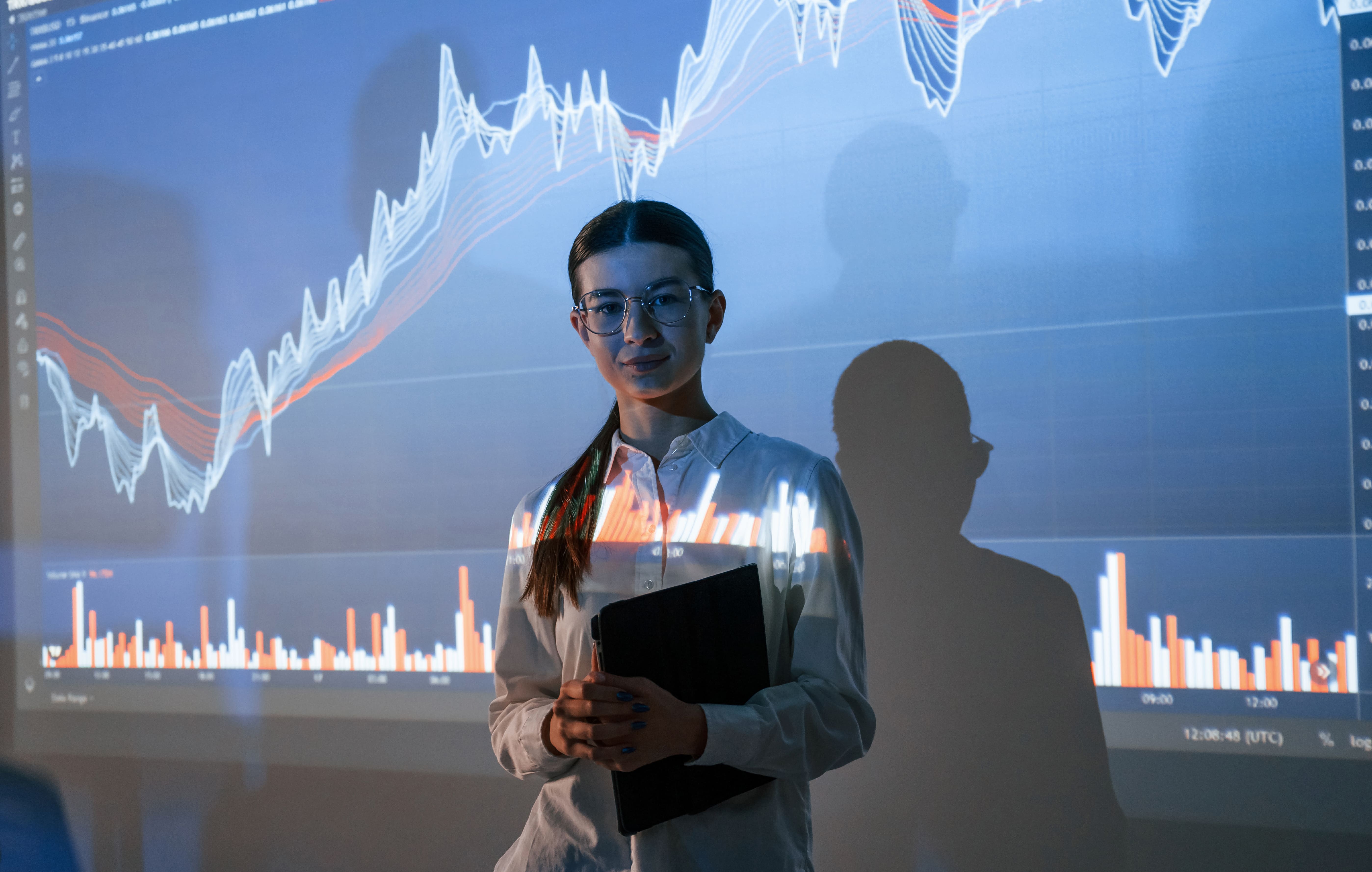 Woman with Finance Graphs.jpeg