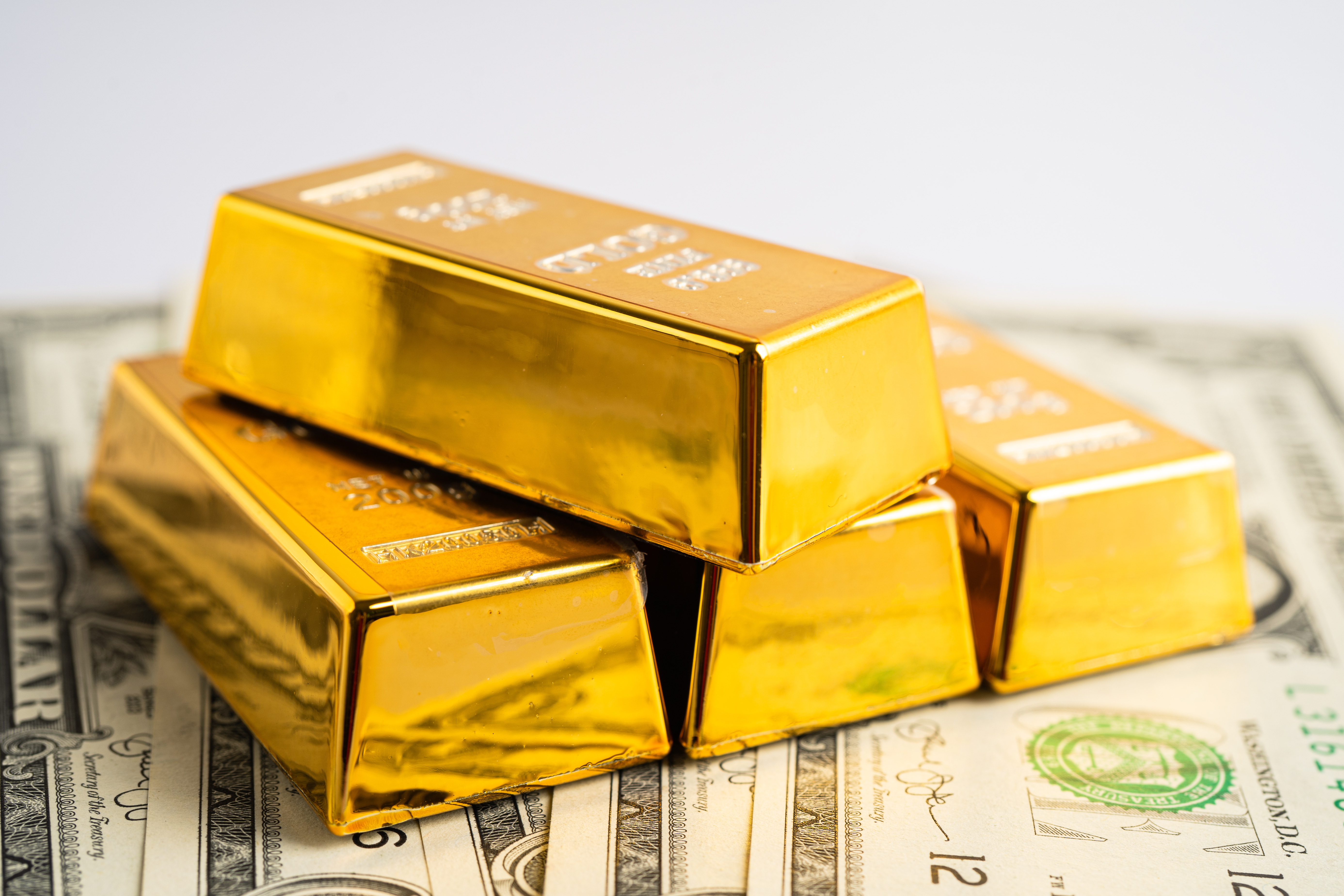 Gold Bar on Dollar Banknotes.jpg