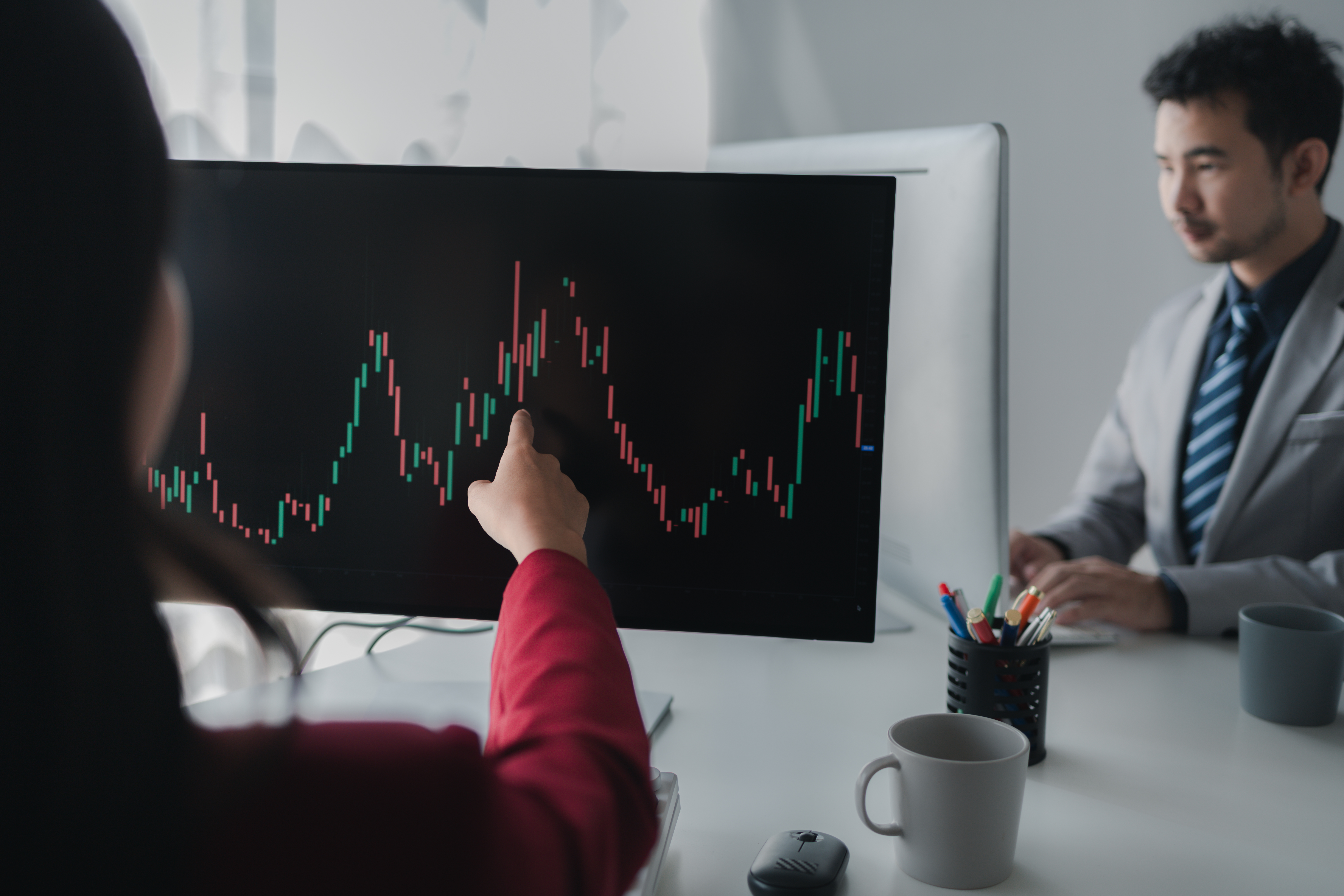 Asian Woman Stock Market Graph Jan 7 2026.jpg