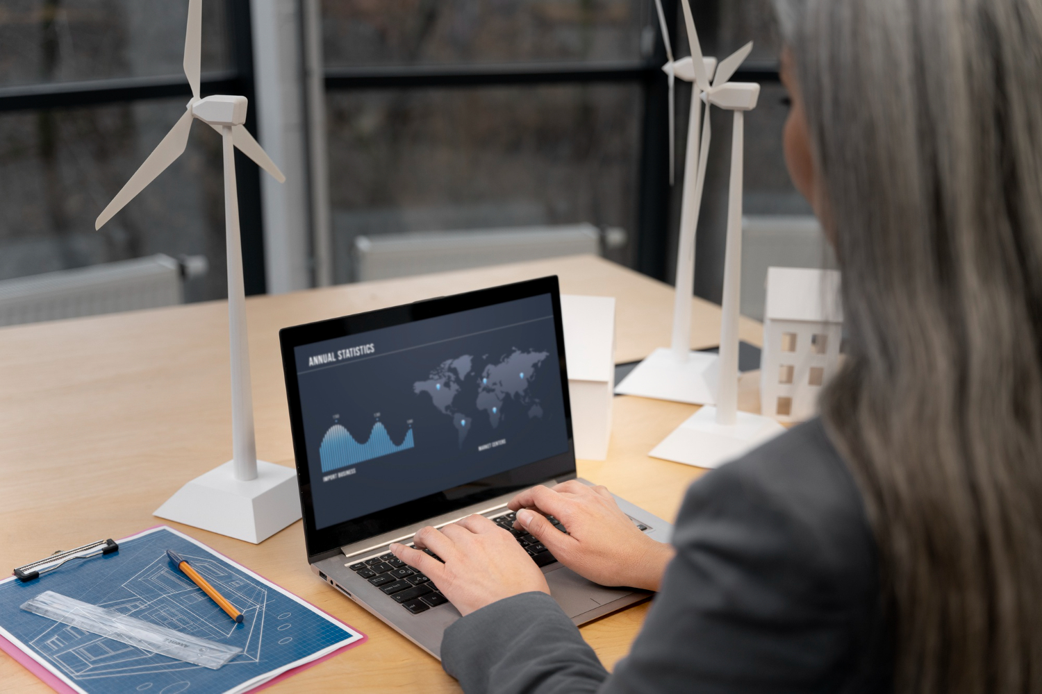 business-person-planning-alternative-energies.jpg business-person-planning-alternative-energies.jpg