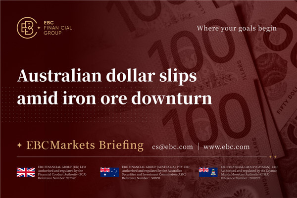 Australian dollar slips amid by iron ore downturn